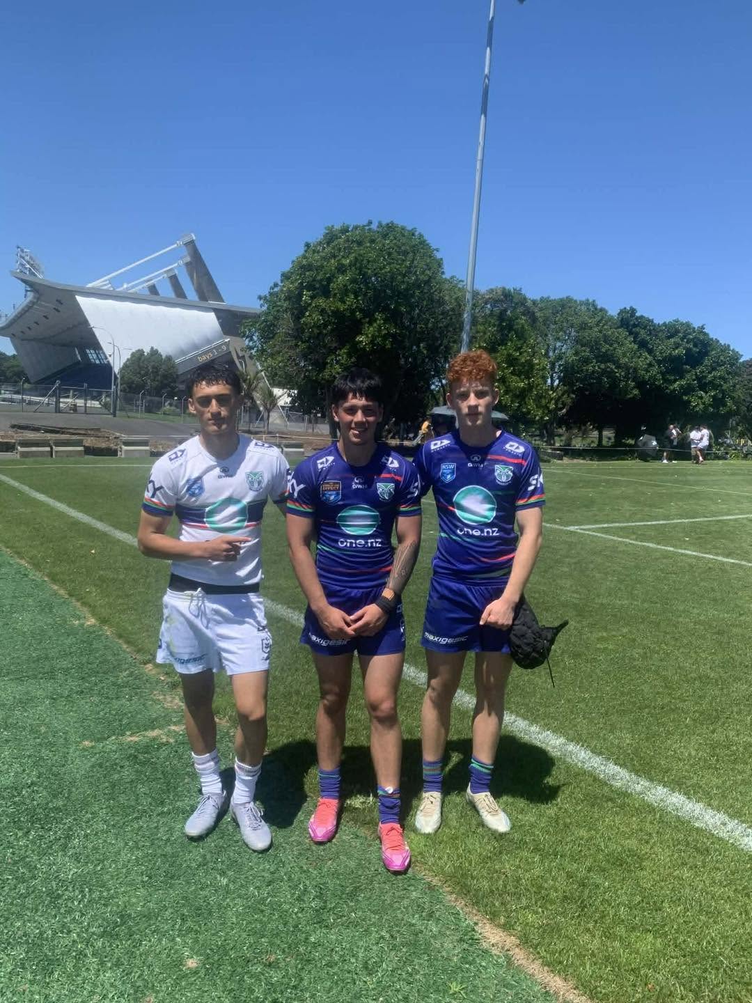 Students on rugby field celebrating success