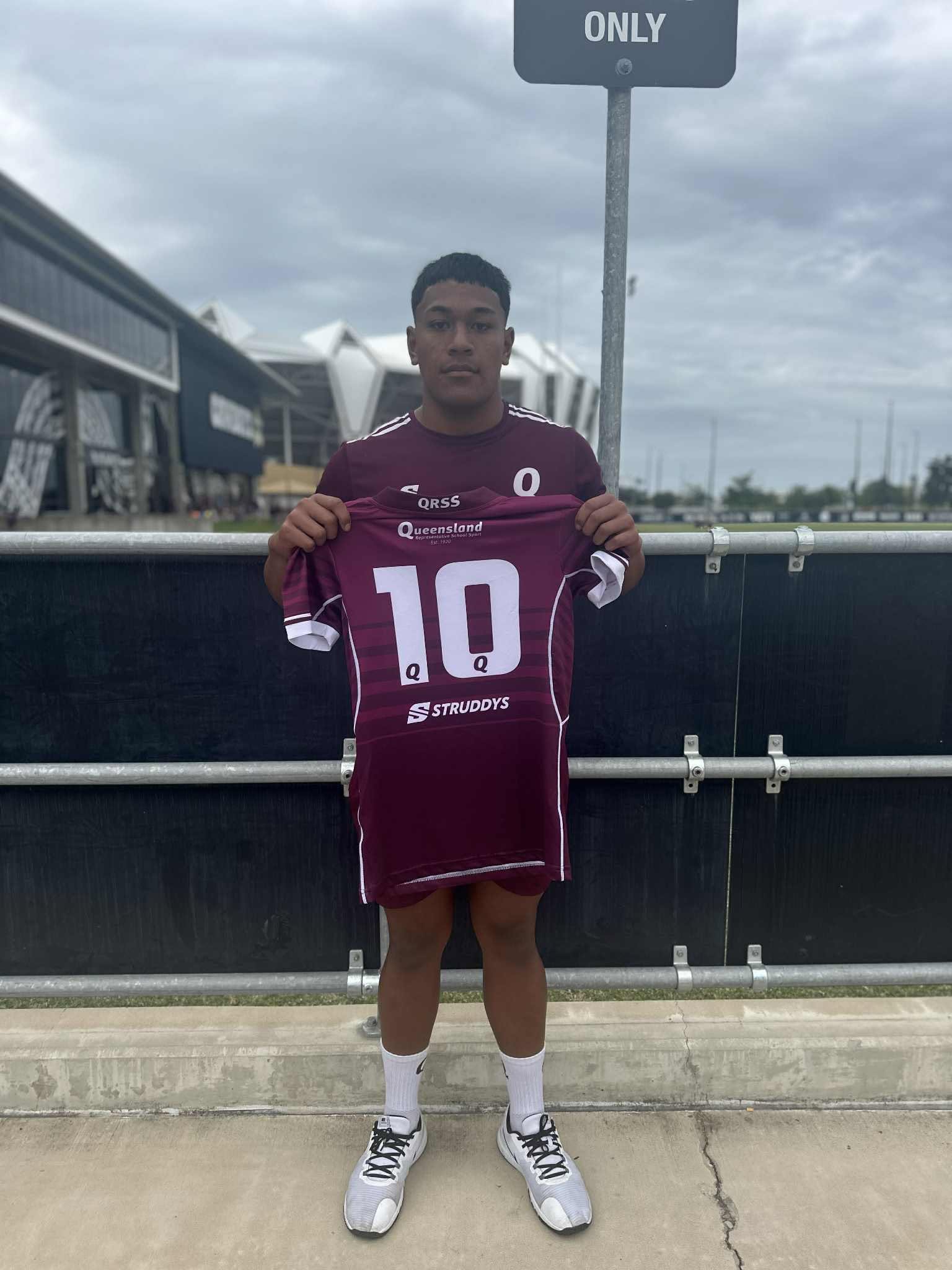 Student proudly displaying Queensland rugby jersey